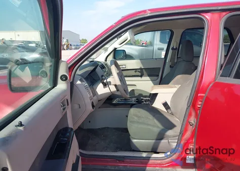 2010 Mazda Tribute I from USA, damaged, VIN 4F2CY0C75AKM03573